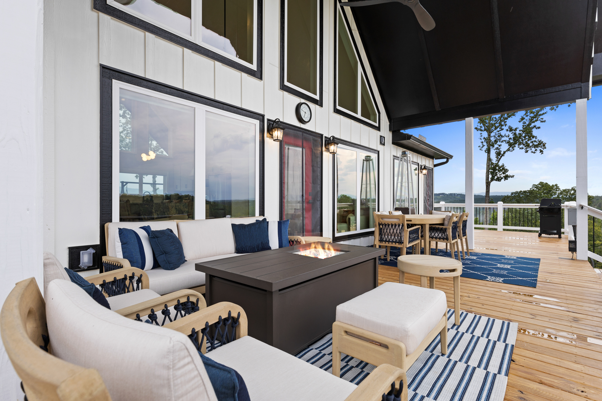 Covered deck with outdoor lounge and fire pit