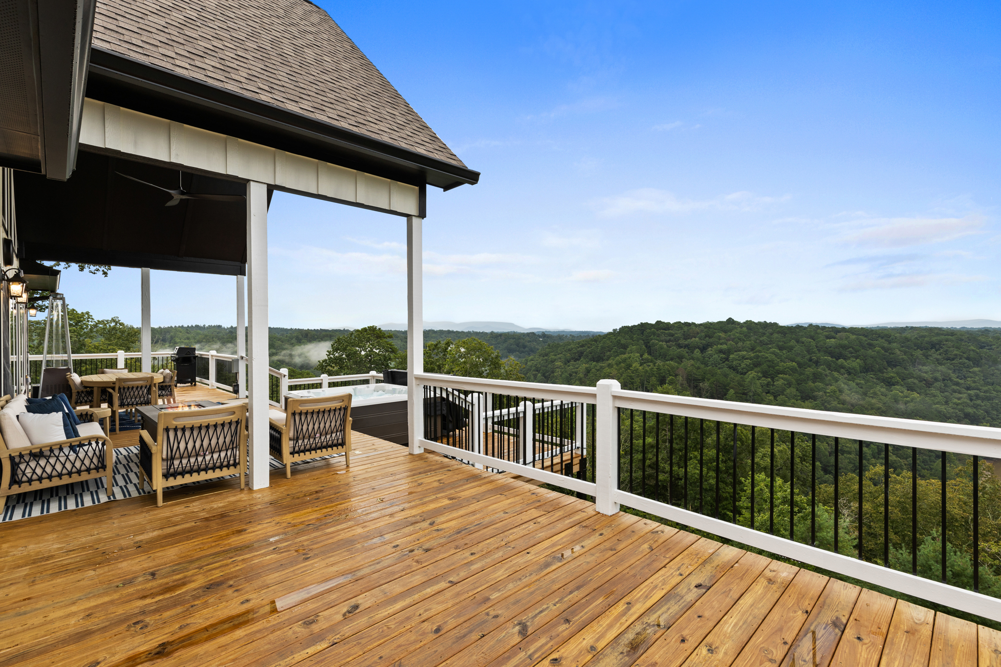 Deck railing with mountain valley view