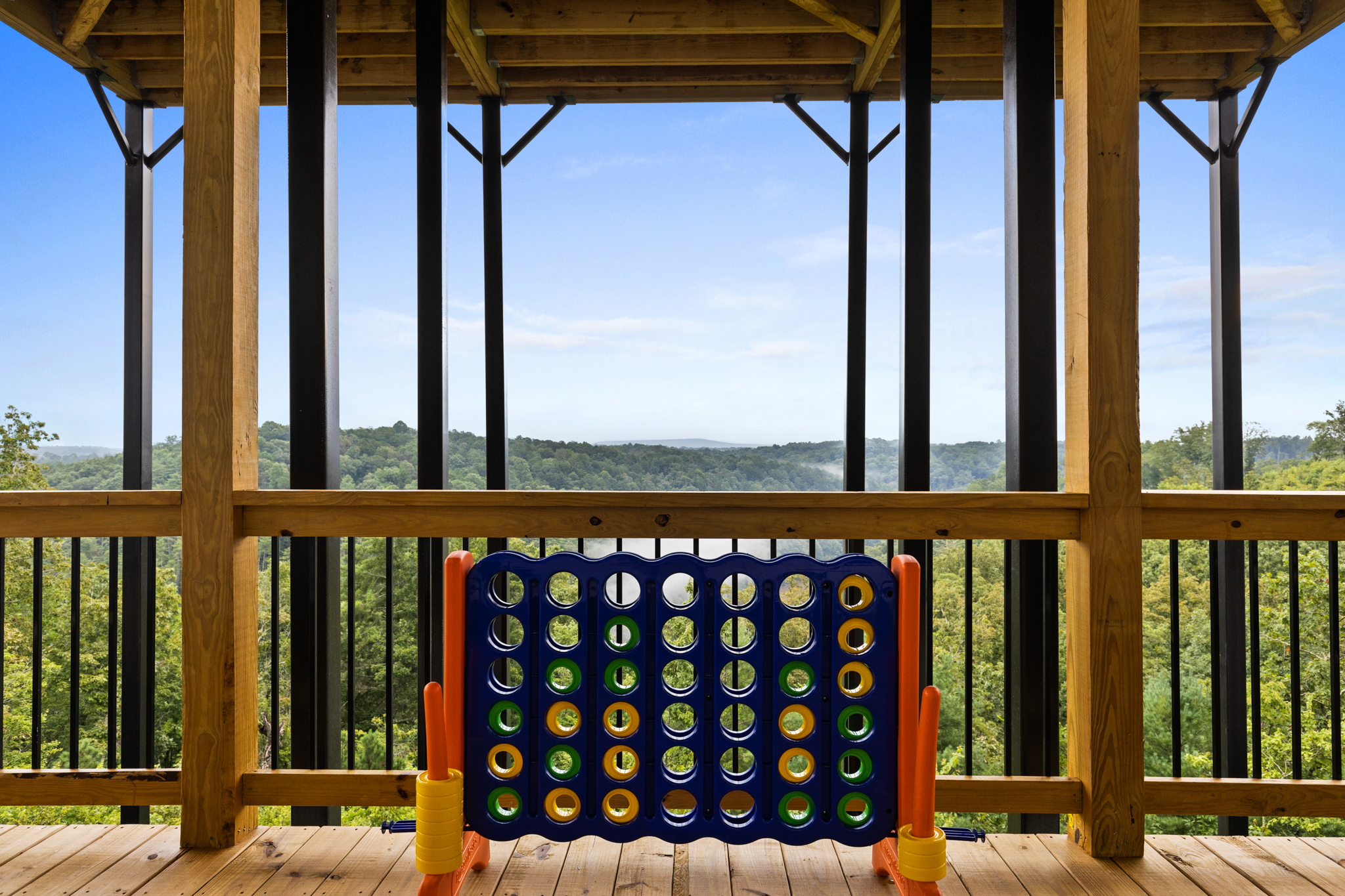Lower deck with giant Connect Four game