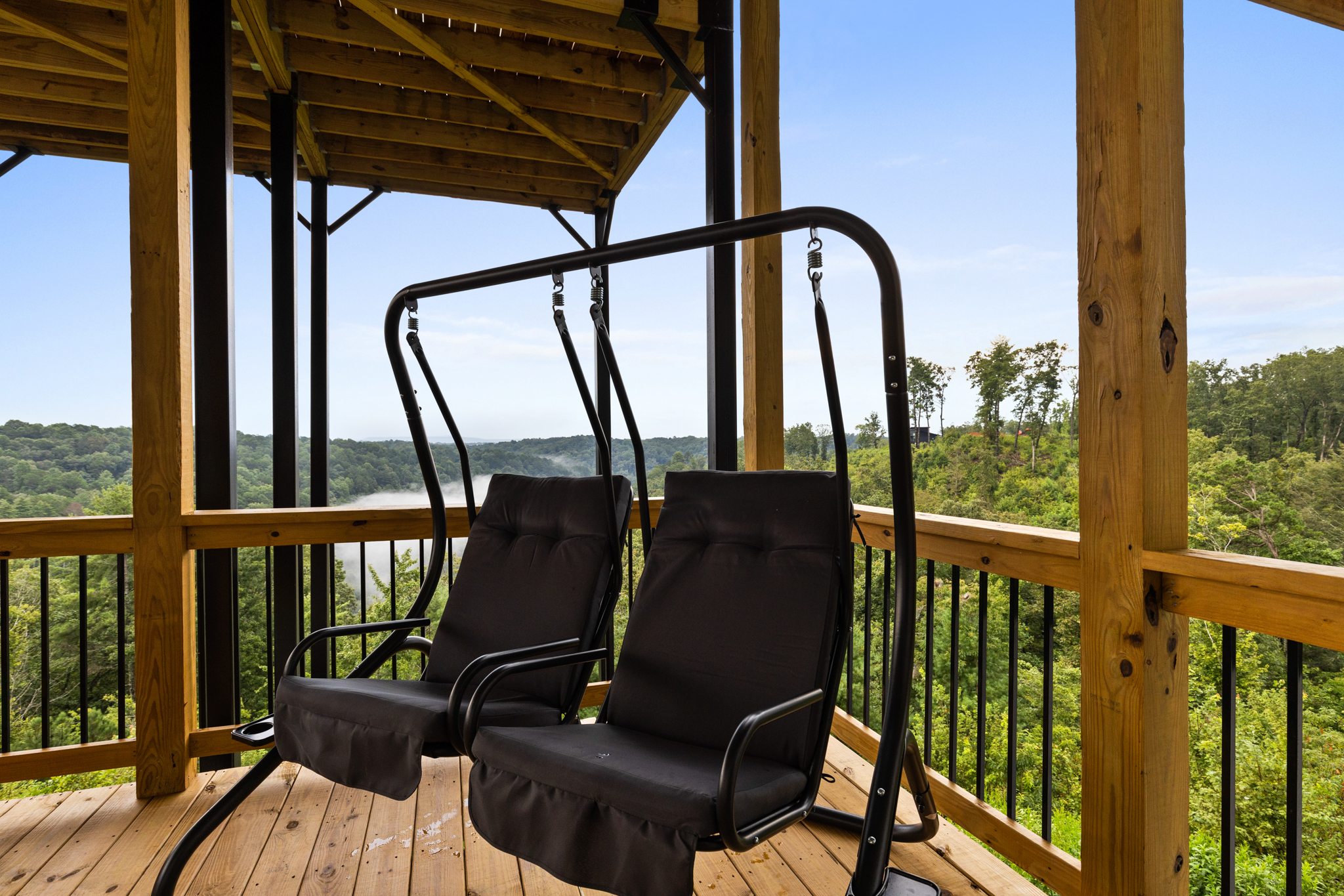 Lower deck double swing with mountain view