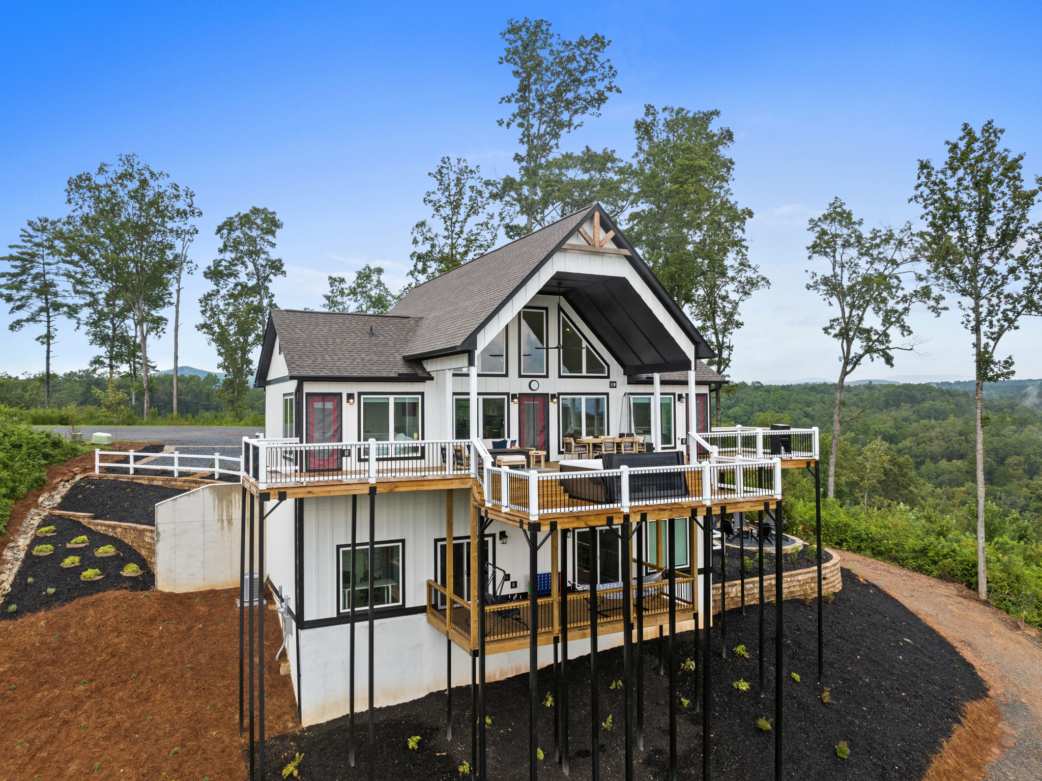 Rear view showing two-level deck with mountain backdrop