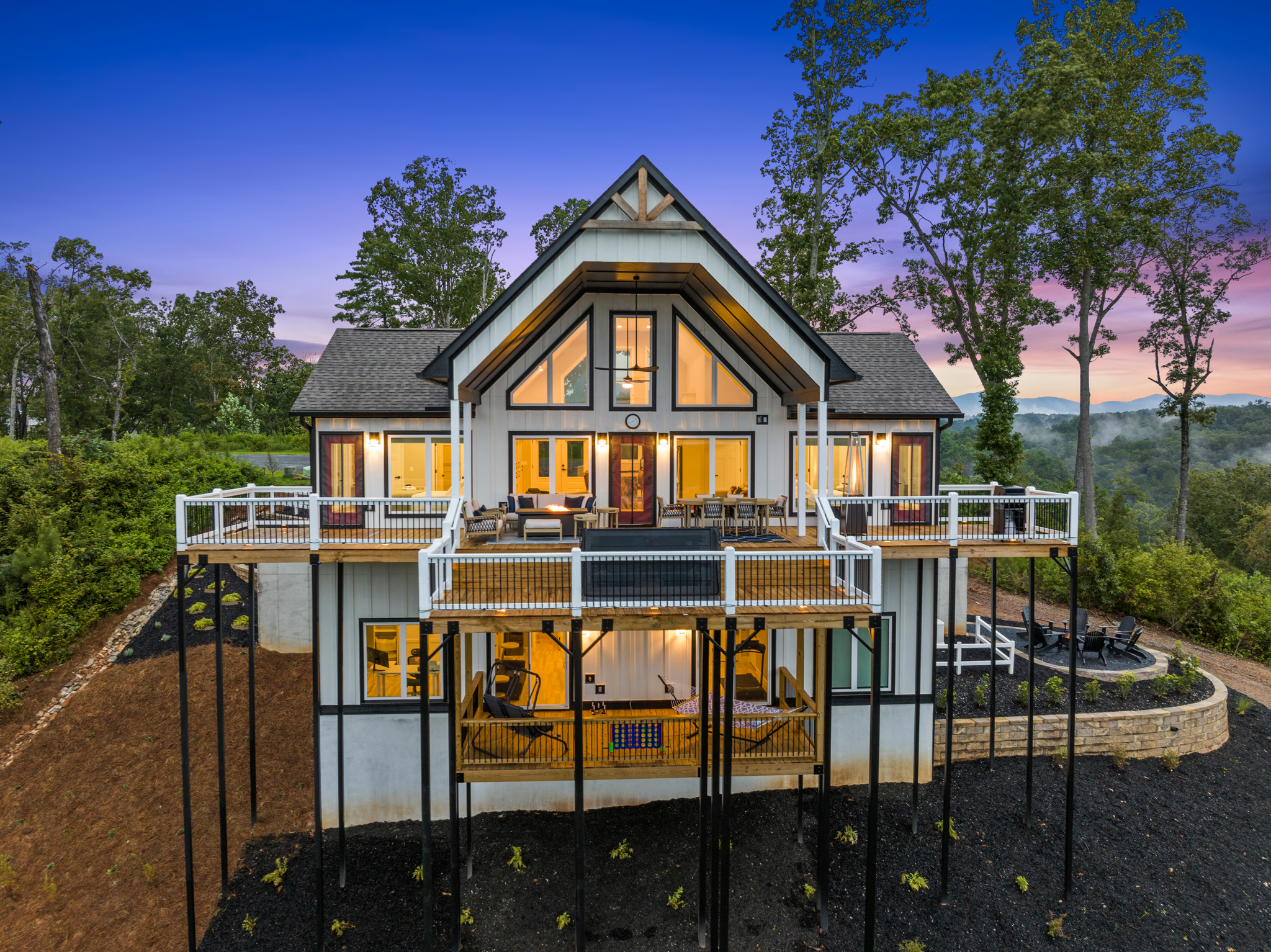 Full rear view at twilight with both decks visible