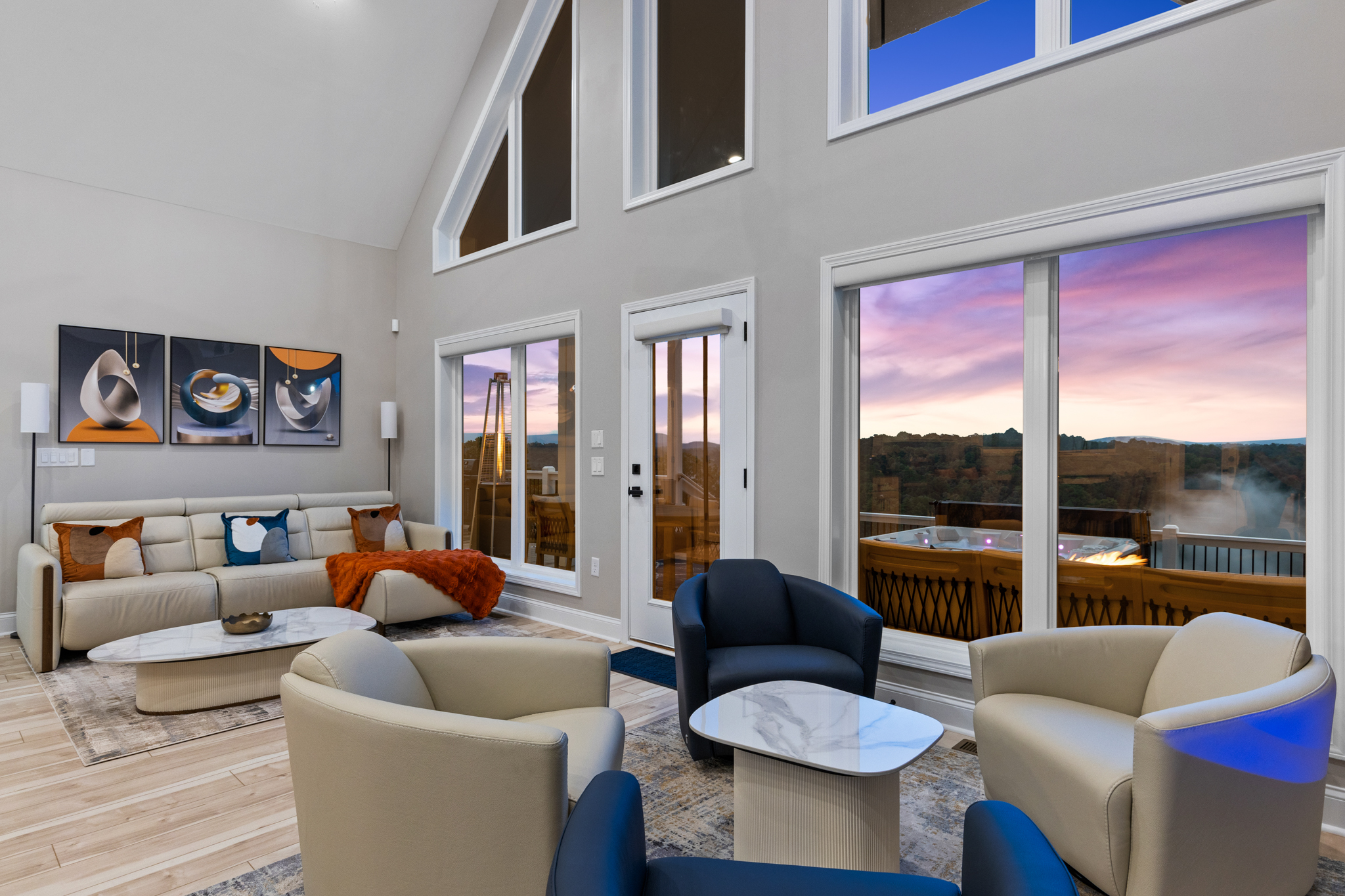 Living room at evening with sunset through windows